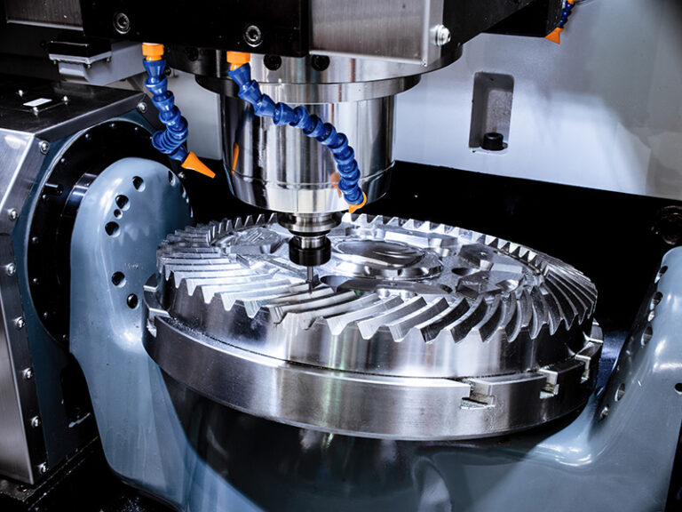 A Modern Cnc Milling Machine Makes A Large Cogwheel.